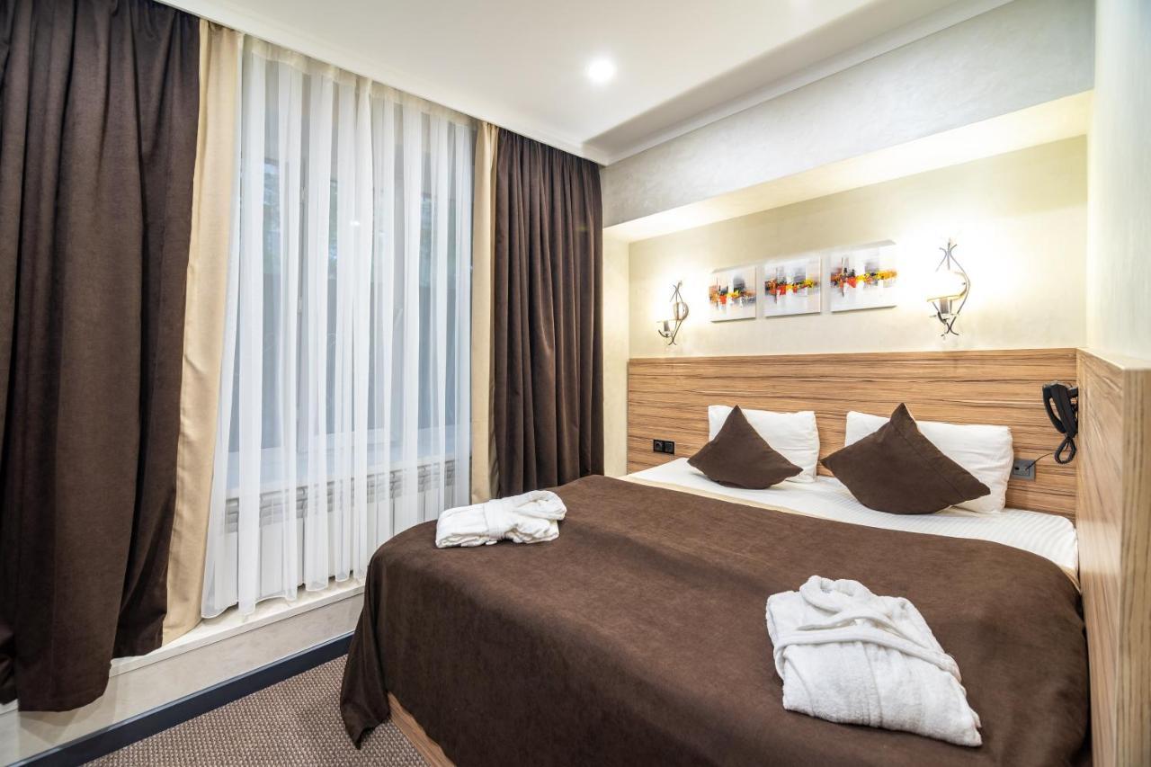 Mildom City Hotel Алматы Экстерьер фото